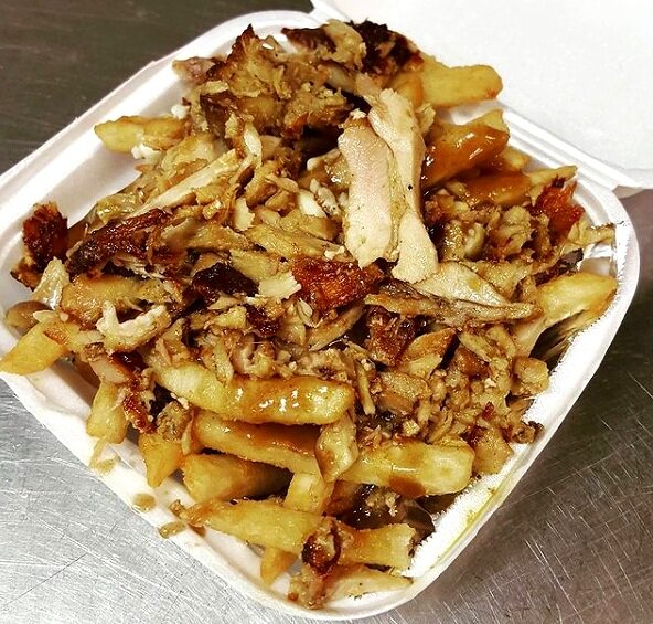Loaded shawarma poutine — fries, curds, gravy, shawarma